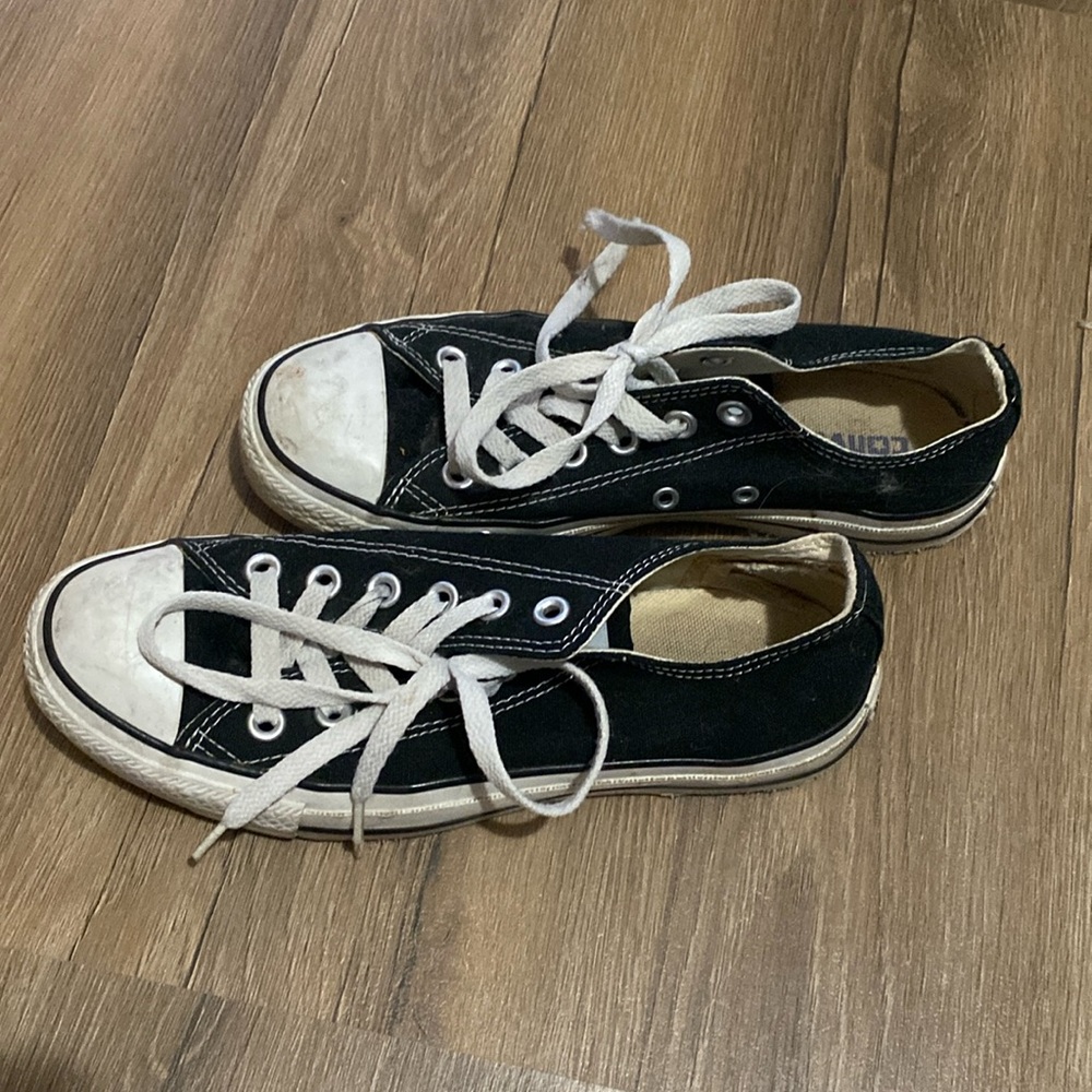 Black low top converse size W7 M 5